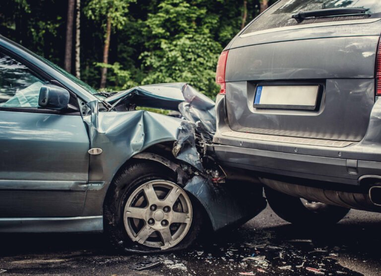 Close up smached cars on a road