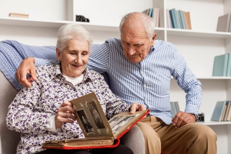 mature-couple-looking-into-photo